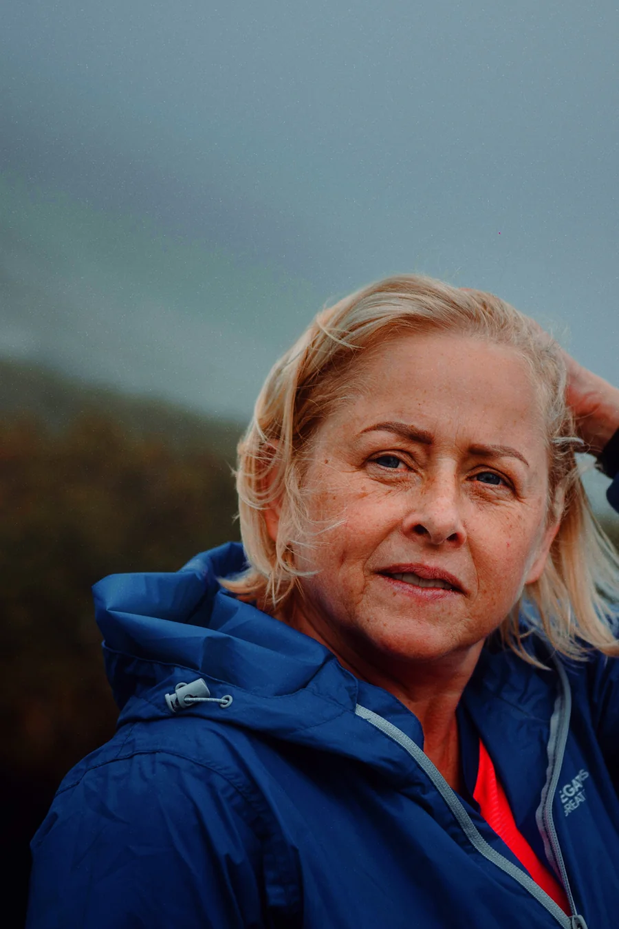 A portrait by the sea on an overcast day, developed in the SATURA look