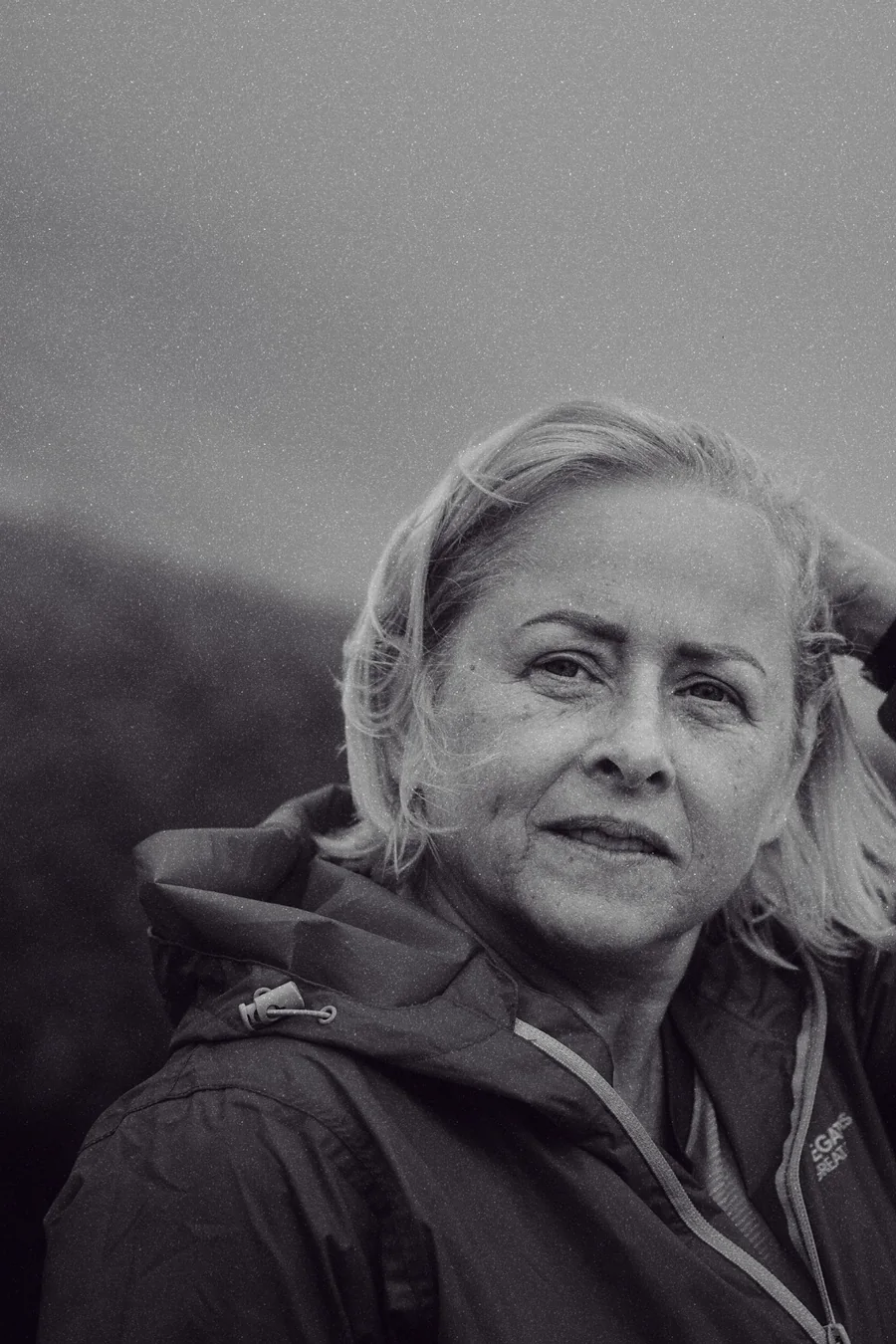 A portrait by the sea on an overcast day, developed in the SELENIUM look