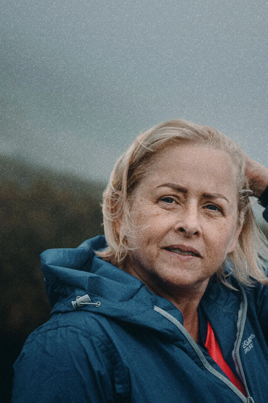 A portrait by the sea on an overcast day, developed in the STREET NEG look